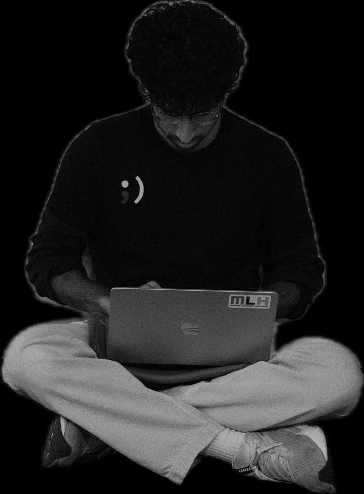 A builder working on their laptop