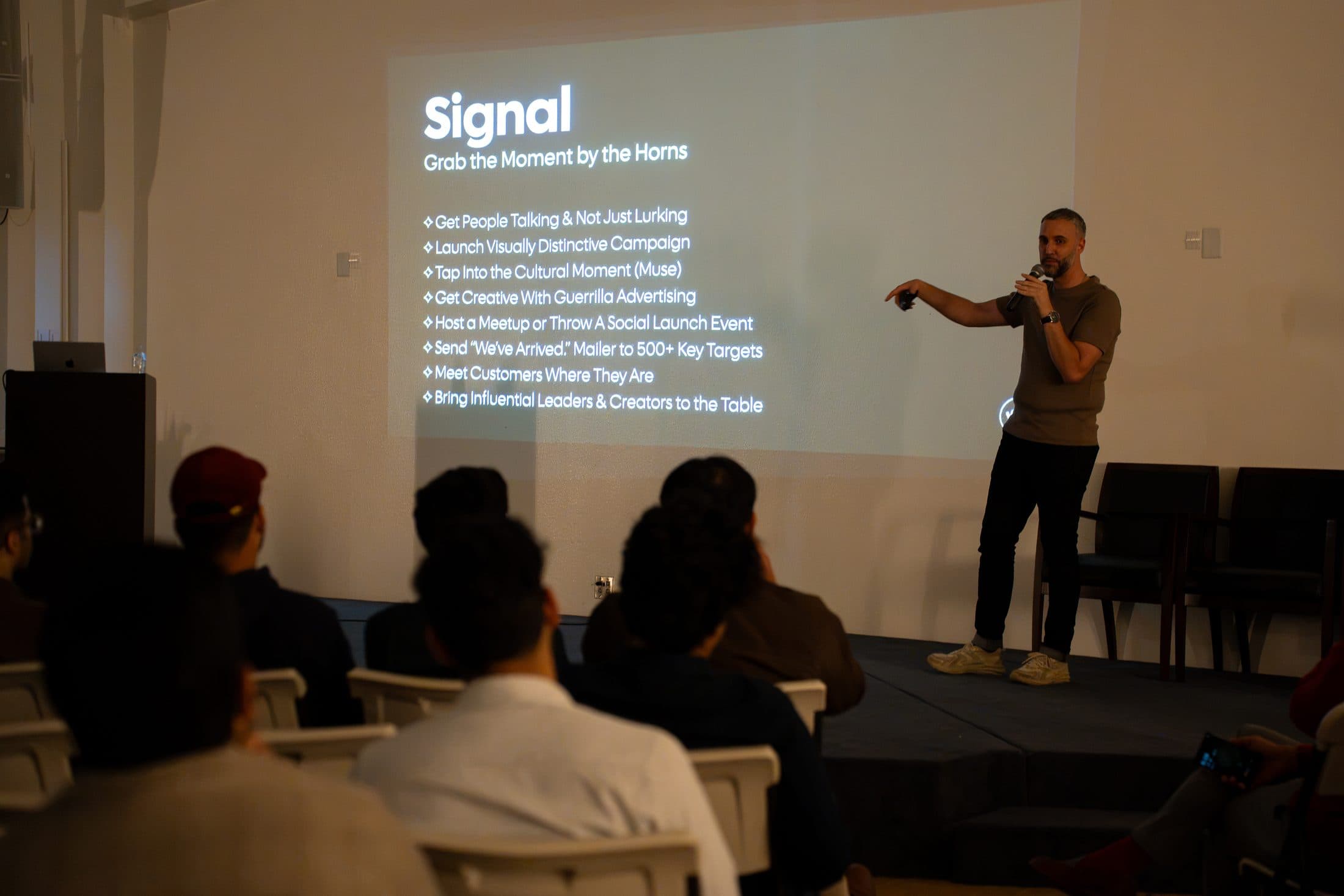 Tarik pointing to the Signal stage of his roadmap