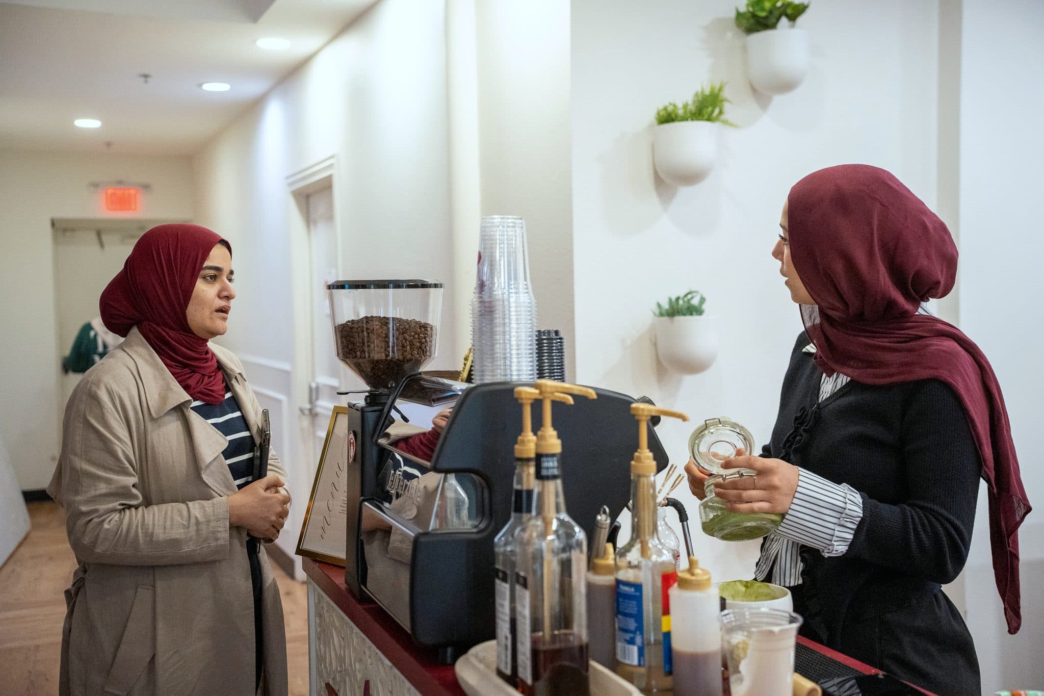 The barista at the Lune Coffee cart